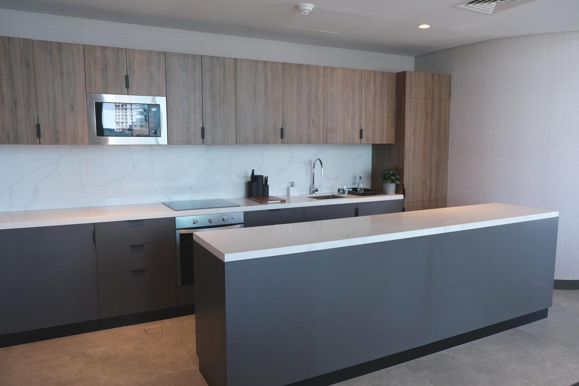 Charthouse Bahrain Hotel Manama Exterior foto A kitchen in a typical apartment